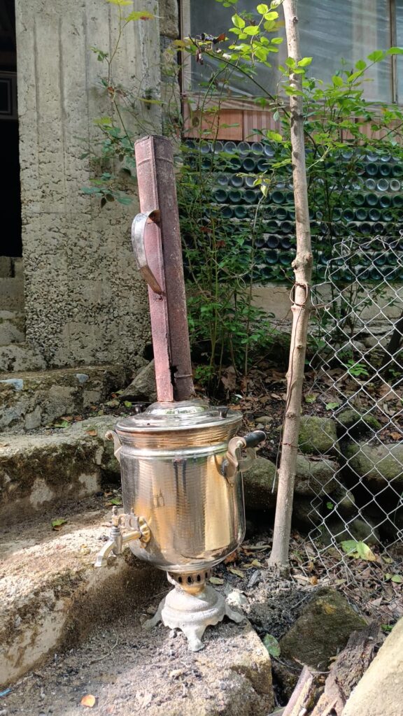 A traditional samovar used for heating water and preparing tea in Azerbaijan, showing the classic metal urn central to tea culture