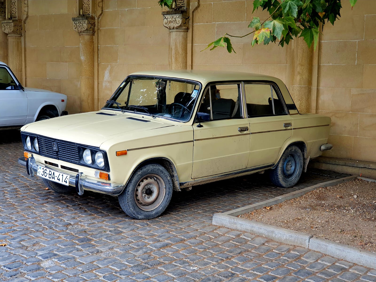 A weathered VAZ-2106 Lada 1600 in Azerbaijan, showing decades of use but still operational